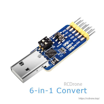 6-in-1 USB to serial converter module board with mode switch and multi-pin header, angled view