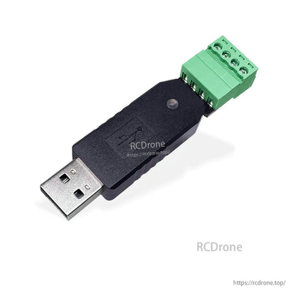 USB to serial converter dongle angled view showing USB-A plug and 4-pin screw terminal