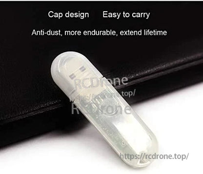 USB-HID Bluetooth adapter with protective cap design, pocket-size dongle shown on black background