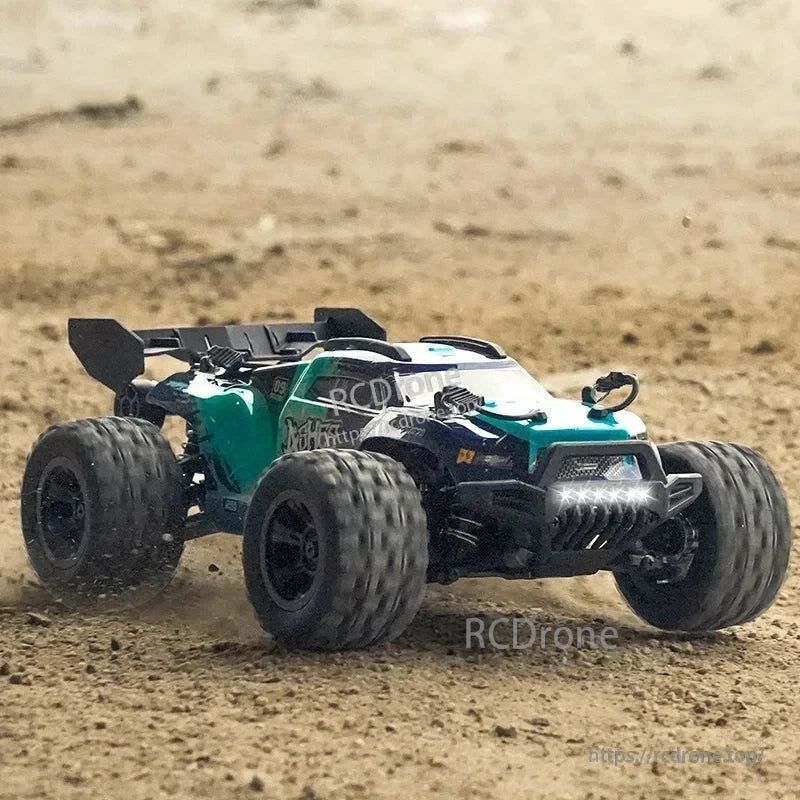 The Wltoys 18101 Pro RC car is a 1/18 scale, 4WD off-road truck suitable for flat grounds, sand, mud, and grass.