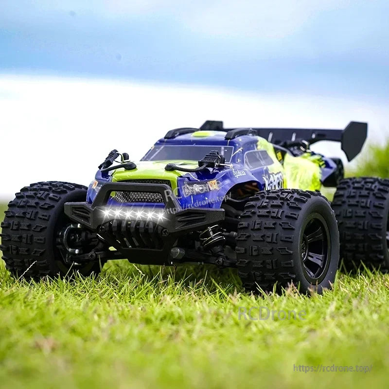 Wltoys 18101 PRO Rc Car, Remote control car with suspension, LED headlights, and simulated big-foot tires for off-road driving on various surfaces.