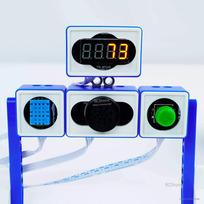 Sensor blocks connected on stand: digital tube display, temperature-humidity sensor, buzzer and green button module