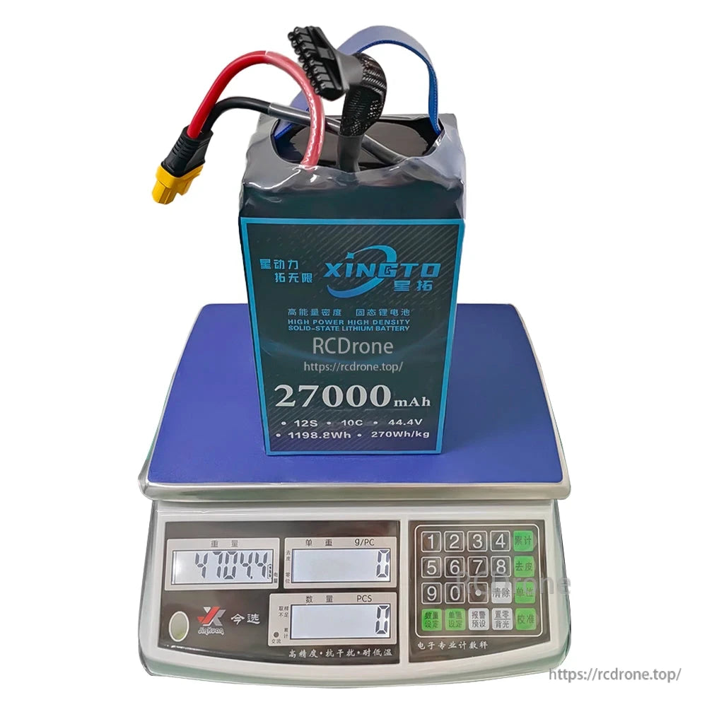 XINGTO 27000mAh 12S lithium battery offers 44.4V, 1198.8Wh, 270Wh/kg for heavy-lift UAVs. Features high density, durability, multi-colored connectors, and precise 4704.4g weight.