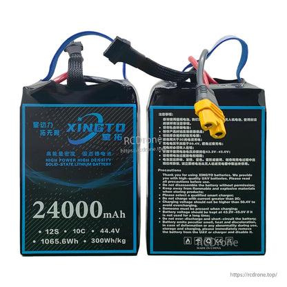 XINGTO 24000mAh 12S solid-state battery, 44.4V, 1065.6Wh, 300Wh/kg. Charge safely, avoid over-discharge, keep from flammables. Made in China.