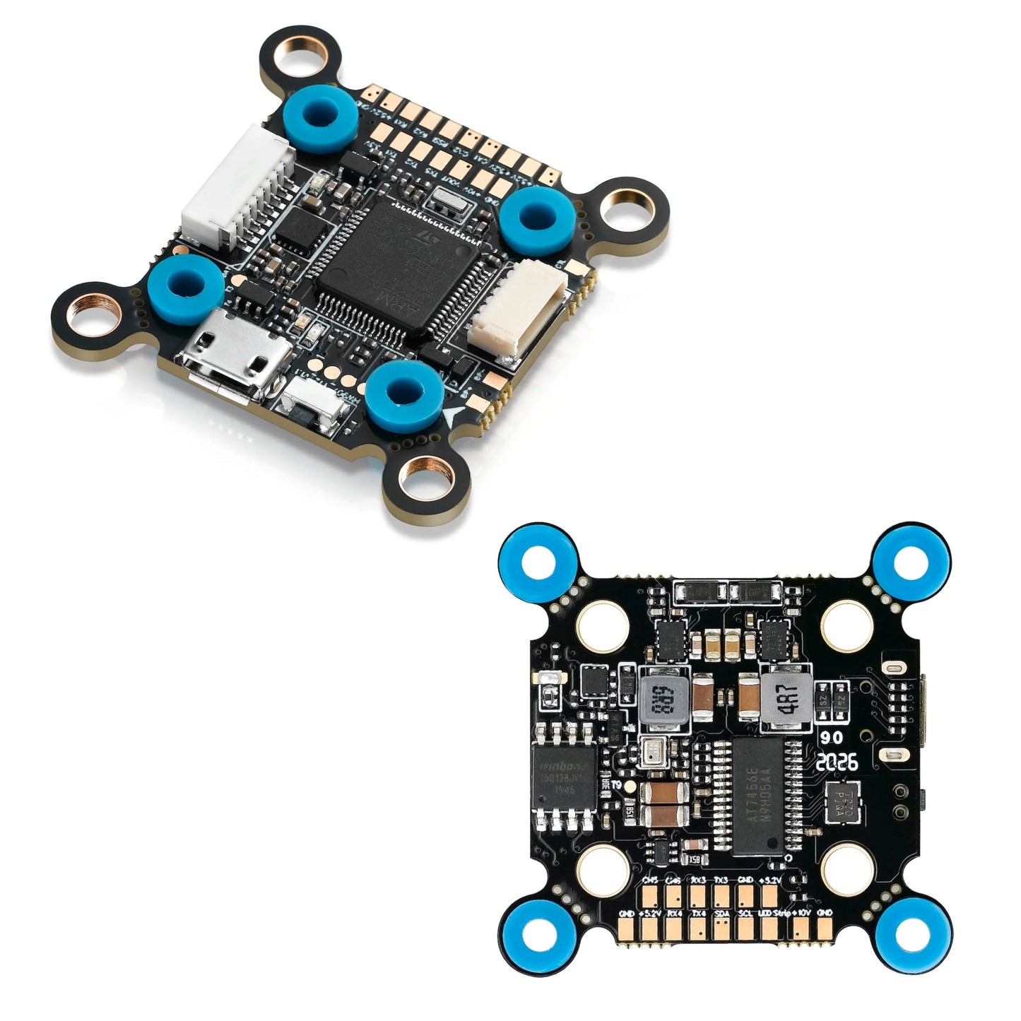Hobbywing XRotor F7 flight controller board with micro USB port, solder pads, and four vibration-damping grommet mounts