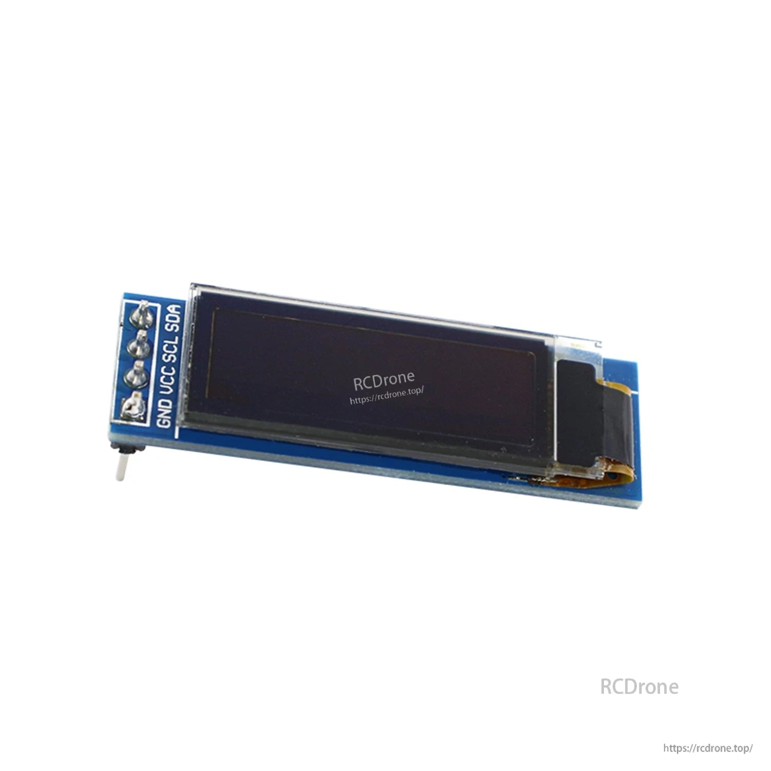 Angled front view of OLED module with protective film and labeled 4-pin I2C header (GND VCC SCL SDA)