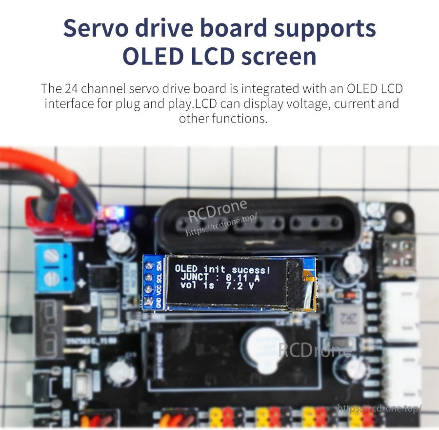 Close-up of servo drive board OLED screen displaying voltage readout for plug-and-play status monitoring