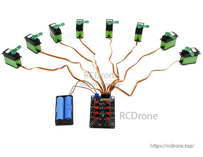 Multi-servo test setup with 8 servos connected to controller board and external battery pack