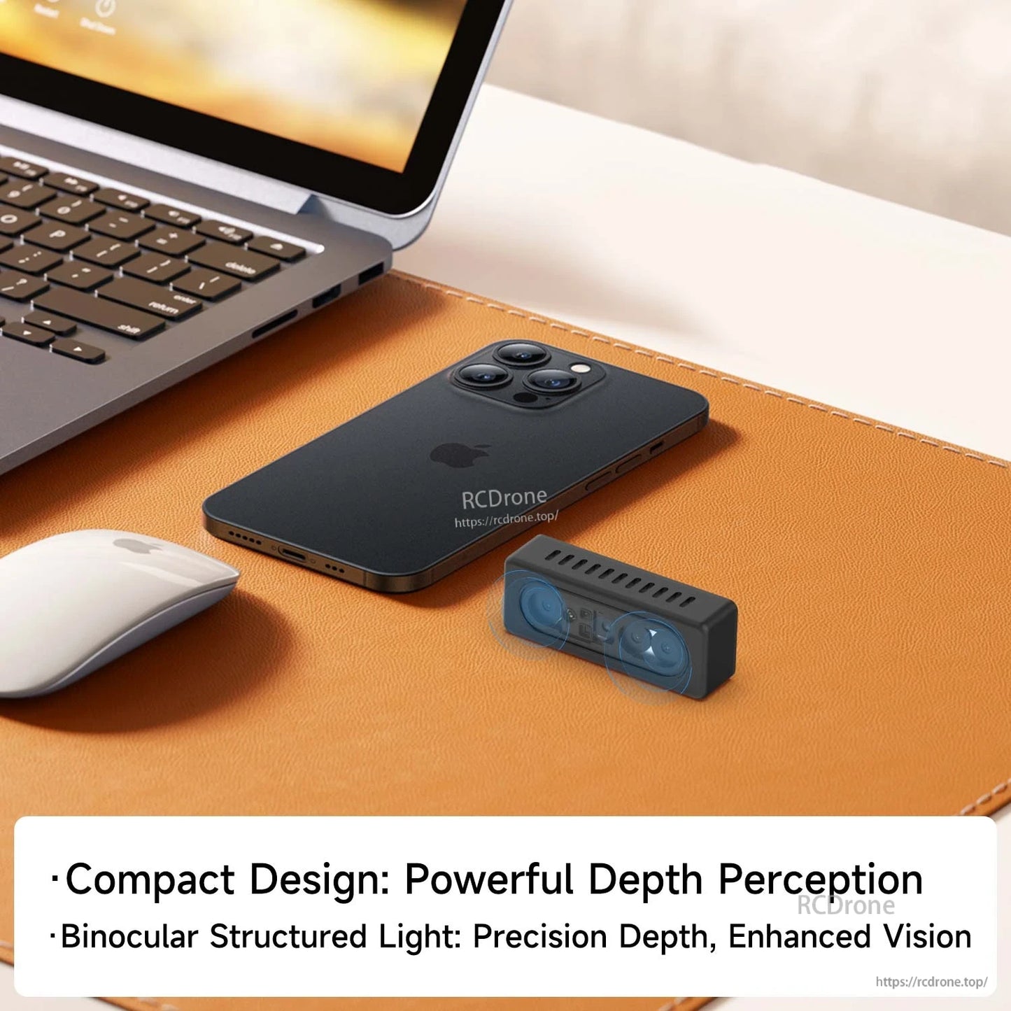 Compact depth camera shown on desk beside laptop and smartphone, highlighting small form factor