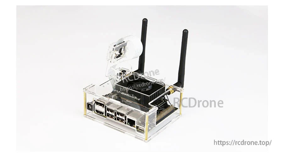 Assembled clear acrylic Jetson enclosure with antenna mounts and full port access on the front edge
