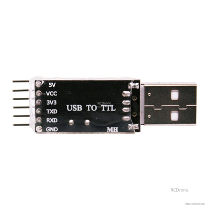 Top view of USB to TTL adapter showing printed pinout: 5V, VCC, 3V3, TXD, RXD, GND