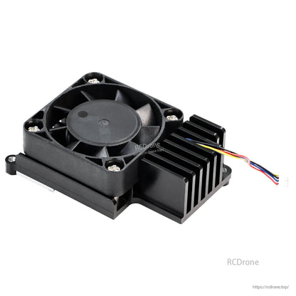 Angled view of Pi50 cooler showing 40mm fan, finned heatsink block, and 4-wire lead