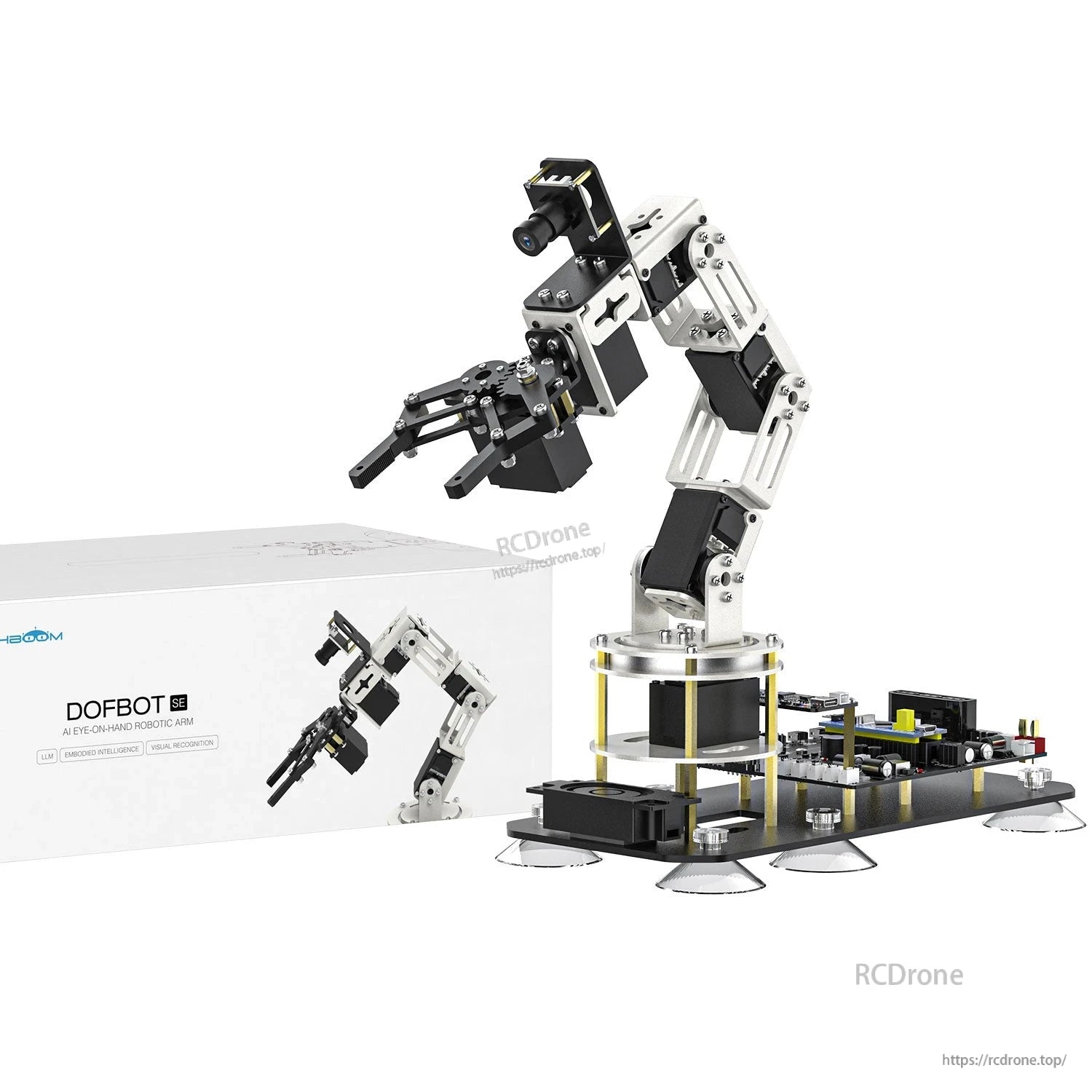 Robotic arm kit beside DOFBOT SE box, alternate angle showing base electronics and gripper position