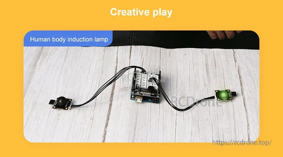 Human body induction lamp demo using the PIR sensor wired to a small controller and LED