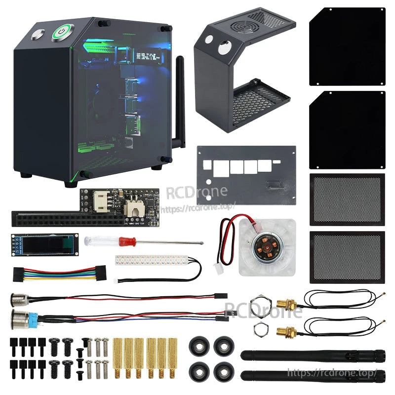 Kit contents laid out: assembled case, plates, dust filters, OLED, fan, cables, fasteners, antenna and tools