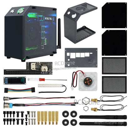 Kit contents laid out: assembled case, plates, dust filters, OLED, fan, cables, fasteners, antenna and tools