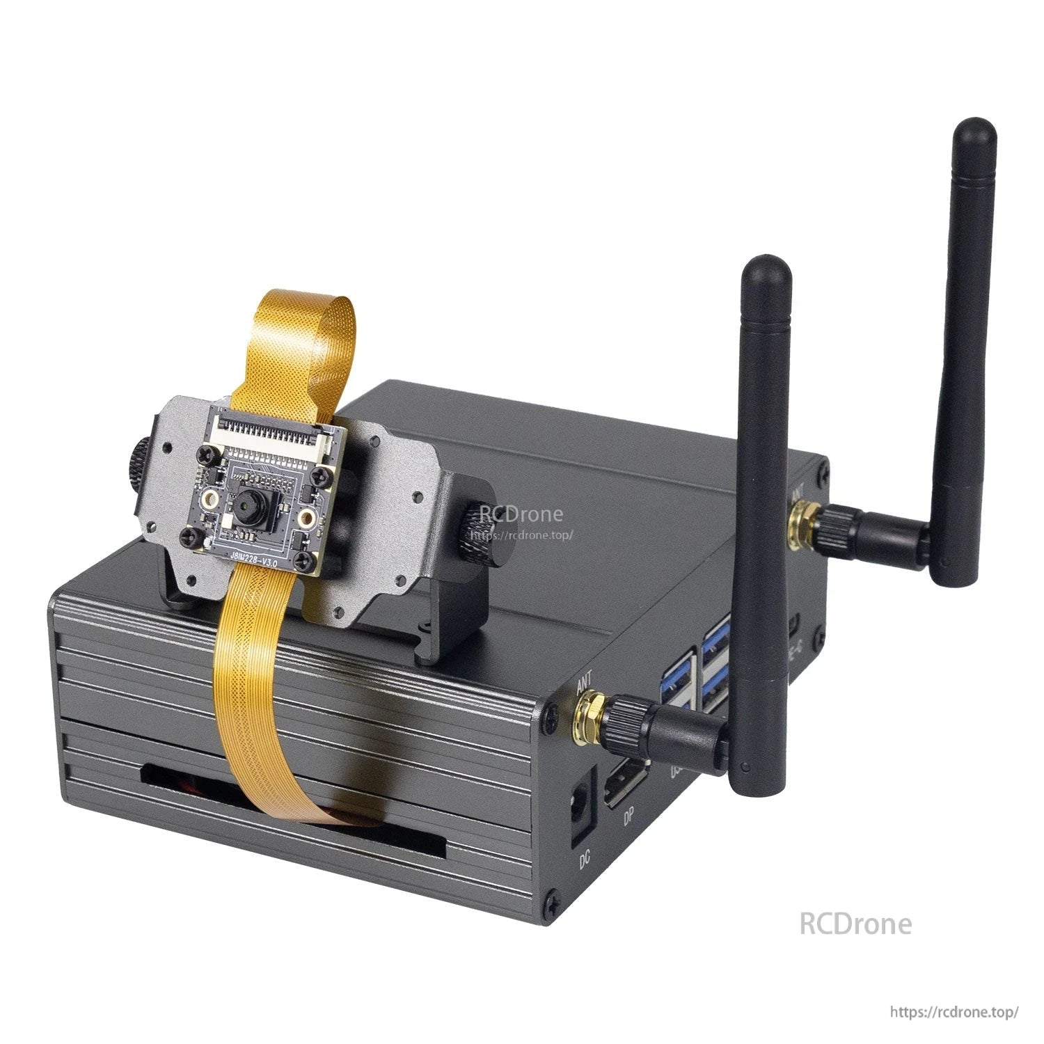 Camera module mounted on bracket with ribbon cable looped over case, dual antennas attached