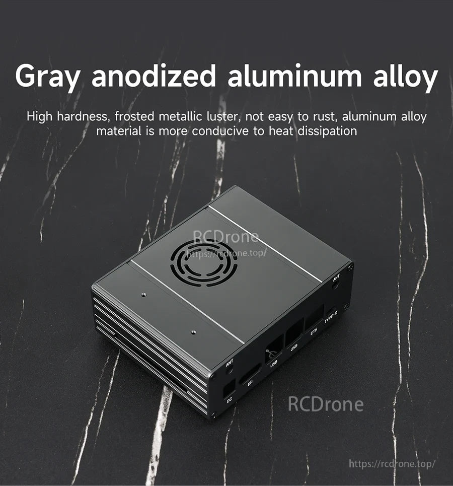 Gray anodized aluminum alloy enclosure with frosted metallic texture and top ventilation cutout