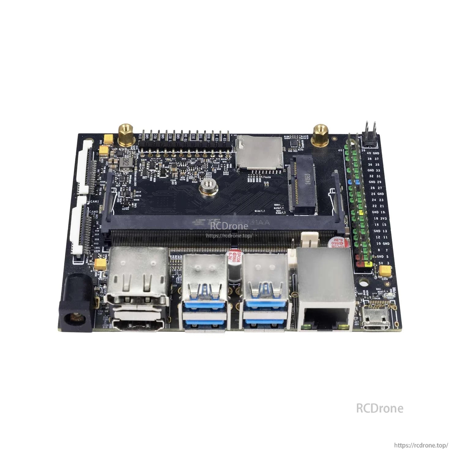 Angled top view highlighting M.2 slot area and right-side 40-pin GPIO header beside I/O ports
