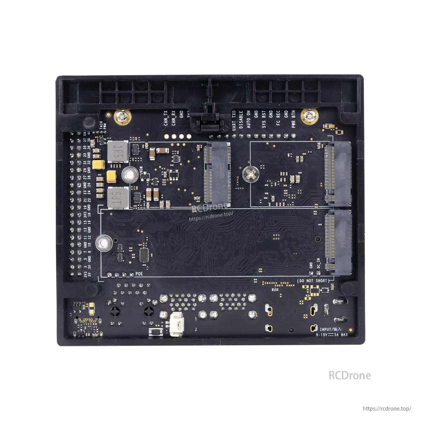 Bottom side of carrier board PCB showing solder points, headers, and connector footprints