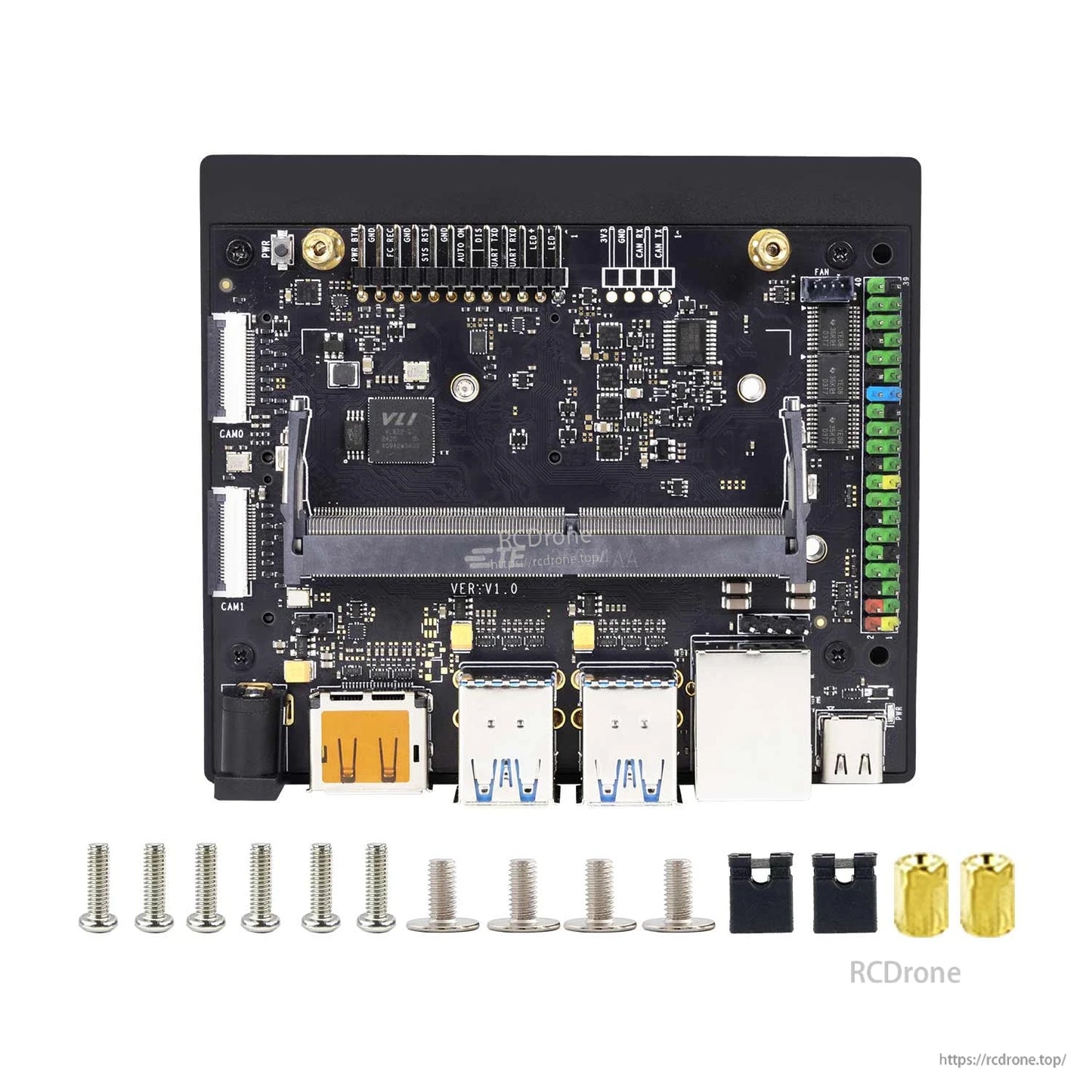 Jetson Orin SUPER carrier board with included screws, standoffs and jumper caps laid out below