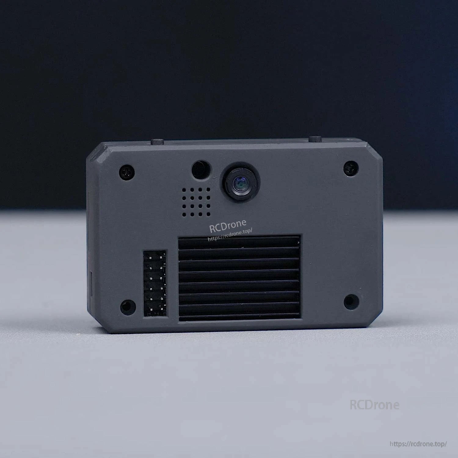 Yahboom K230 vision recognition module back panel close-up with lens, vent grille, and header interface