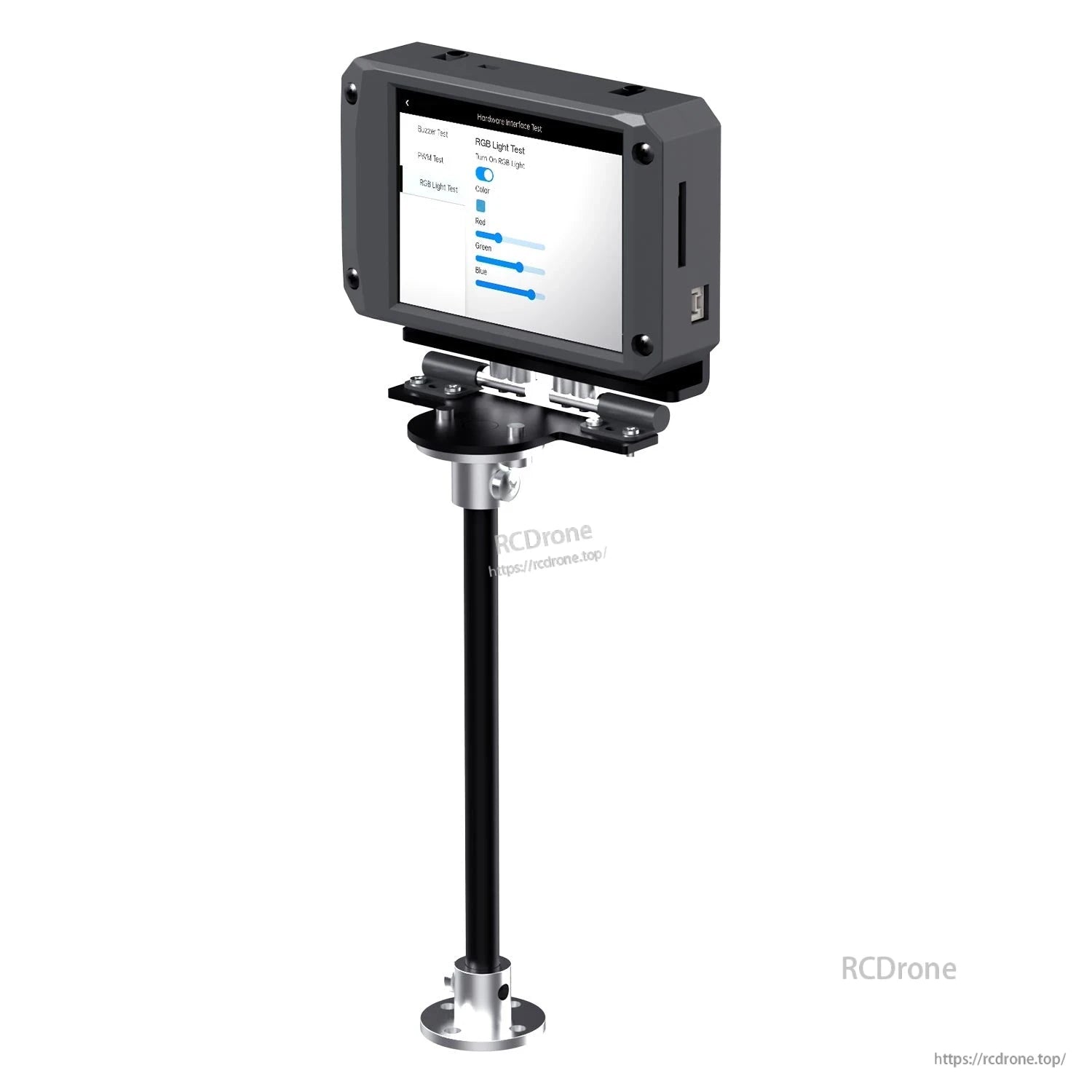 Module mounted on vertical pole stand showing touchscreen hardware test interface