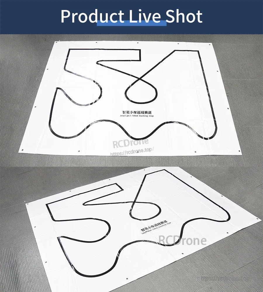 Large white tracking map mat with thick black line course pattern, shown laid flat and angled on the floor