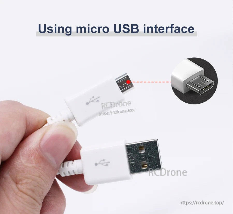 Close-up of USB‑A to Micro USB connectors with molded strain relief on the white cable