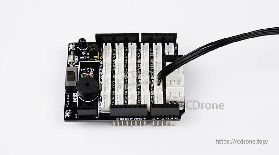 PH2.0 connector cable plugged into a multi-port expansion board with several PH2.0 sockets
