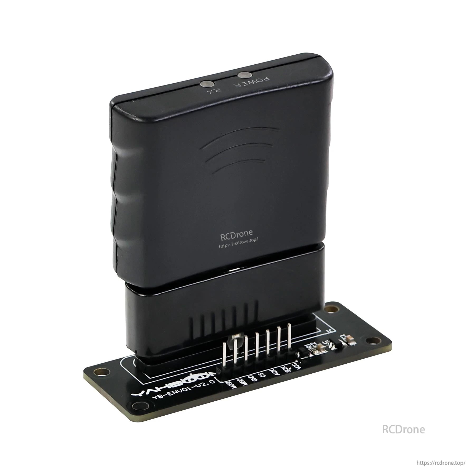 Receiver module seated on adapter board, angled view showing power and link buttons on top