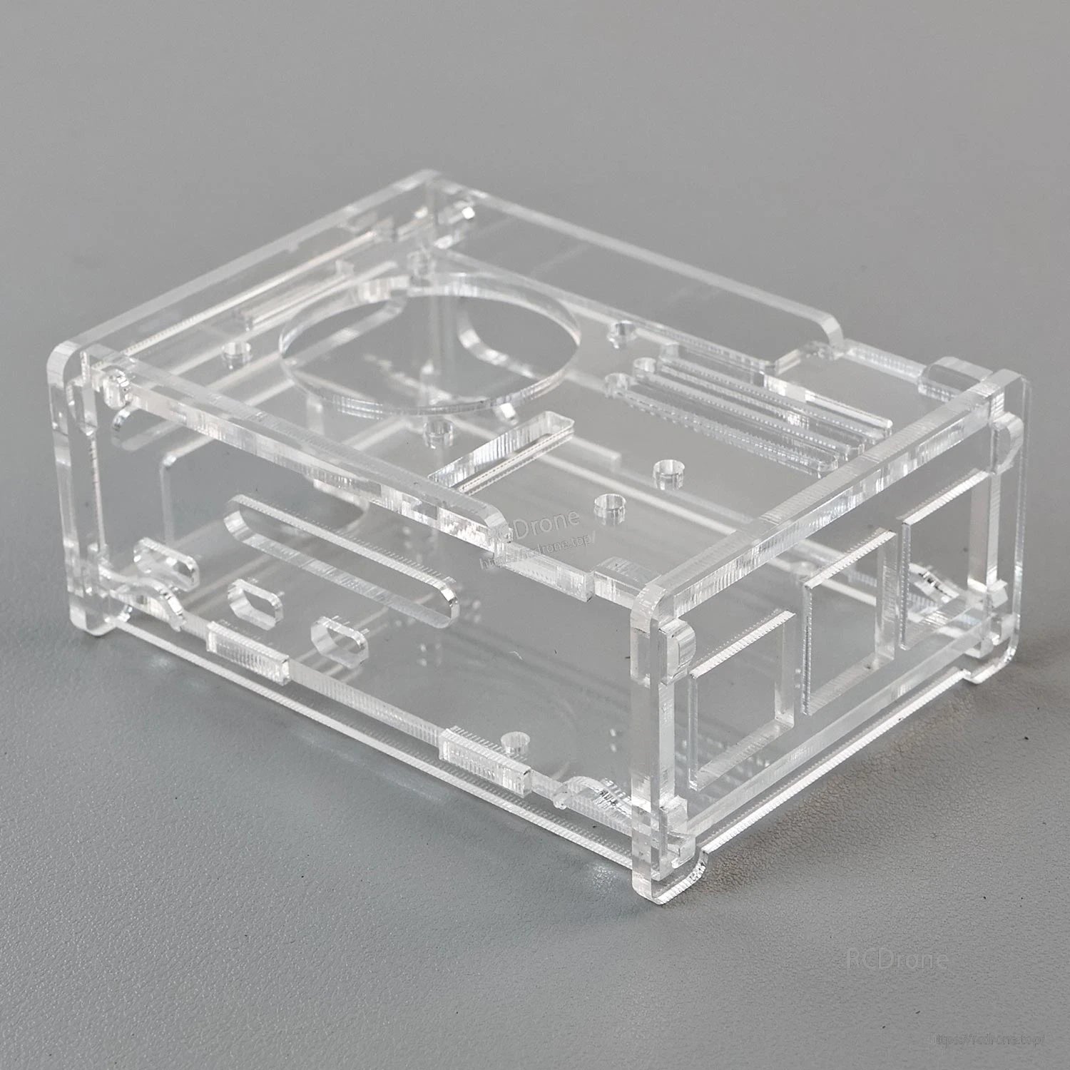 Clear acrylic enclosure only, angled view showing fan opening and side cutouts
