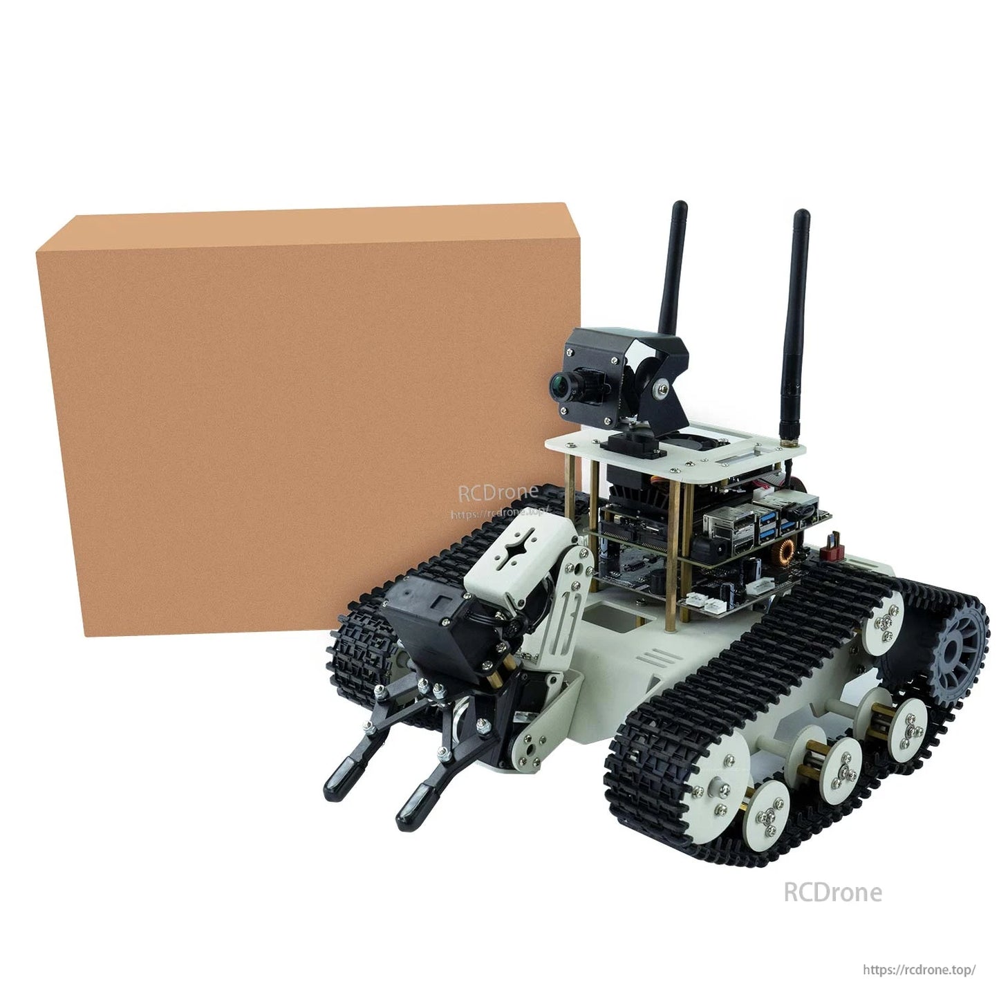 Yahboom Transbot SE ROS Robot tracked car with PTZ camera and robotic arm shown beside shipping box
