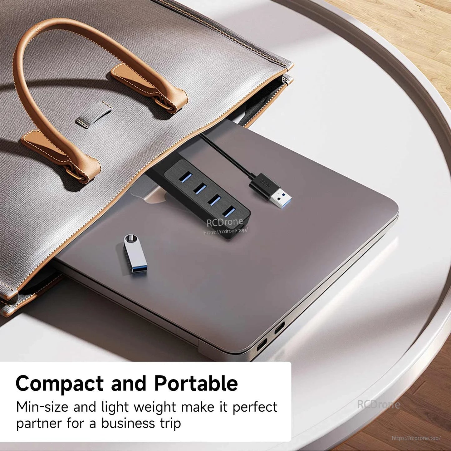 Compact USB 3.0 4-port hub shown on a laptop for travel and portable setup