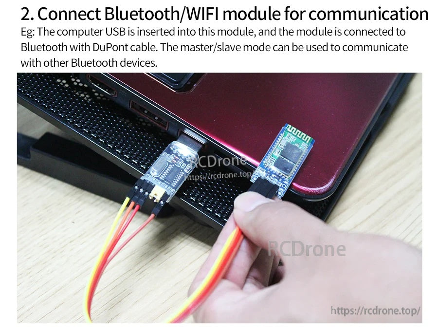 CH340G USB to UART TTL adapter connected to a Bluetooth/WiFi serial module with DuPont jumper wires