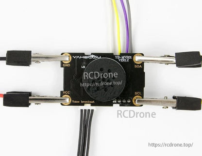 Module wired with alligator clips and lead wires on GND/VCC/SDA/SCL pads to demonstrate hookup