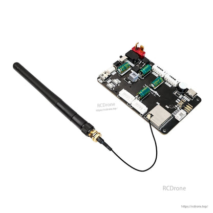 Control board connected to external antenna via coax pigtail, angled top view highlighting antenna interface