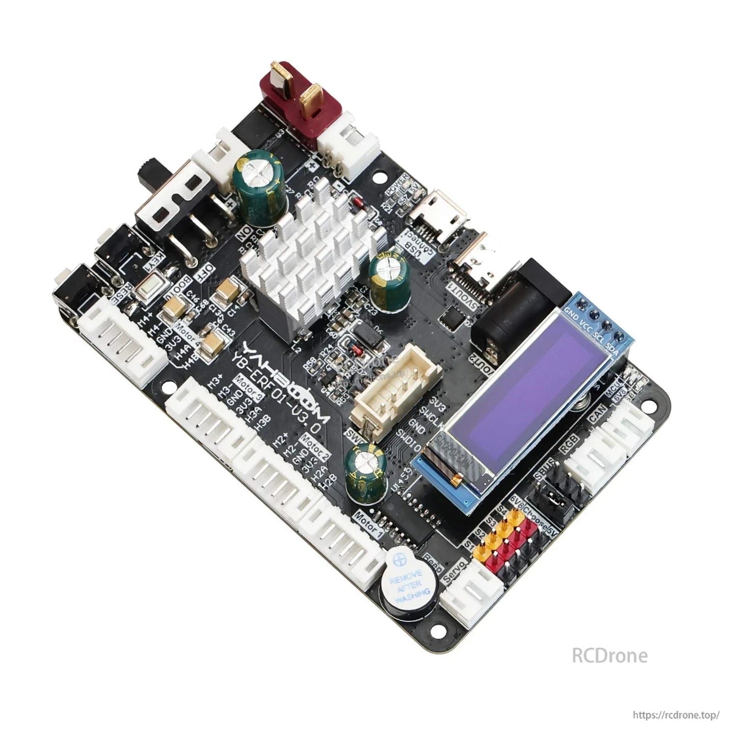 Angled view of the control board with small OLED display module installed and connector ports visible