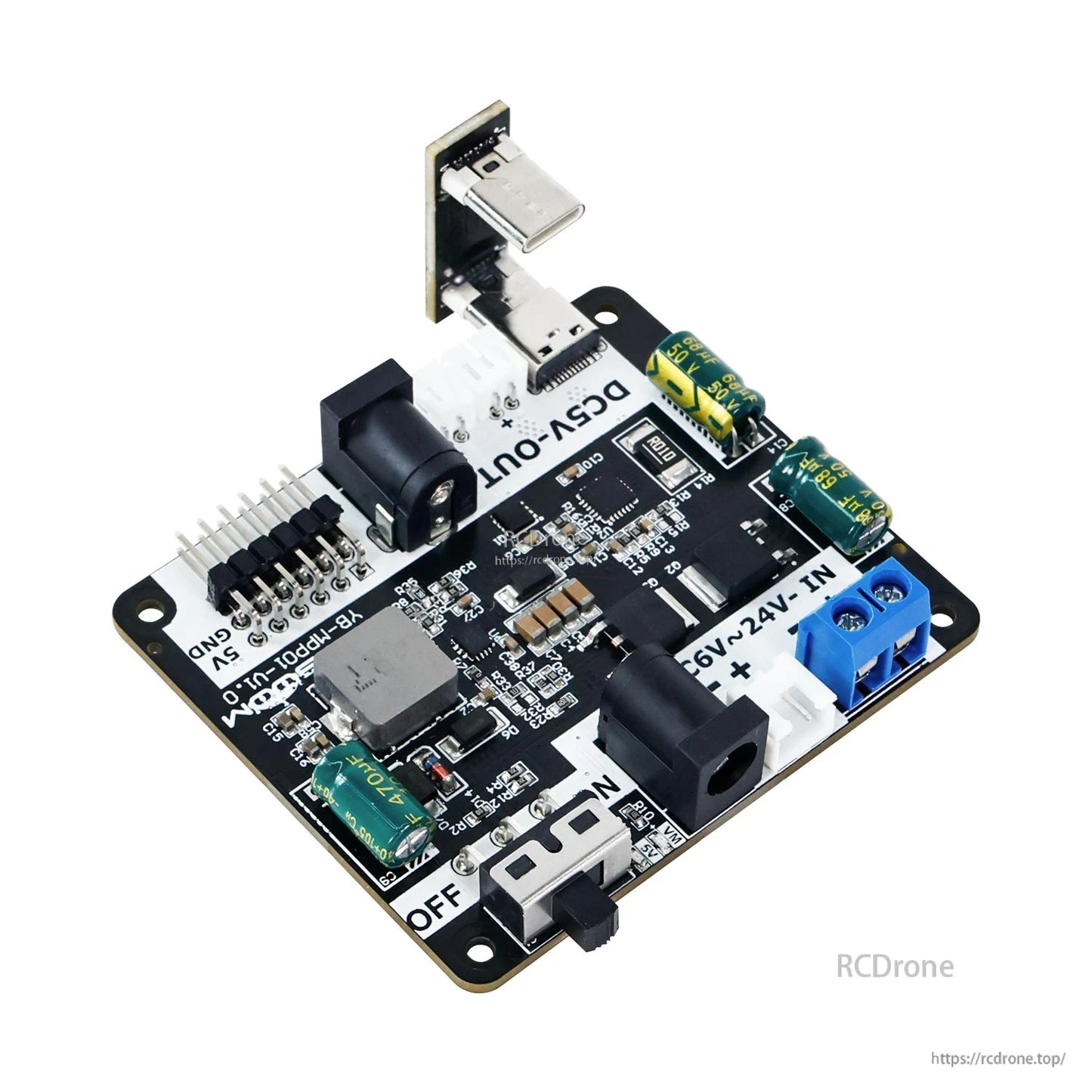 Angled view of the power board showing USB‑C output, DCV‑OUT label, switch, and 6–24V input terminal