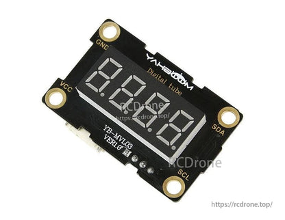 Angled view of Yahboom digital tube display board with mounting holes and printed pin labels around edges