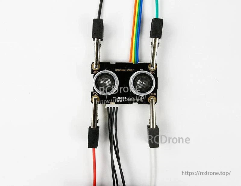 Ultrasonic module wired with alligator clips and jumper leads, connection example on white background