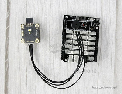 Color sensor module wired to a micro:bit expansion board example, connected with jumper leads