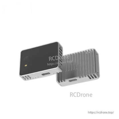 Front and rear views showing sensor face and finned heat-sink back plate, with USB-C port on the base