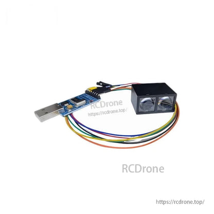 MVR2TB ranging module with UART/TTL USB adapter board and multicolor connection wires on white background