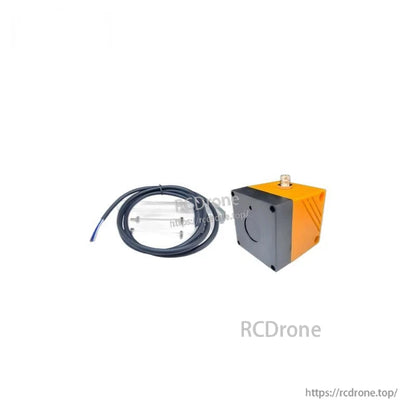 Sensor kit with wired cable lead and mounting plate shown beside the cube-shaped sensor body