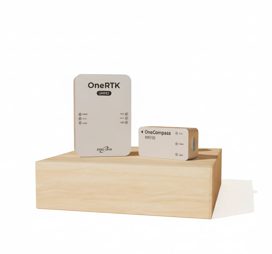 ZeroOne OneRTK UM982 RTK GNSS module with dual antenna and DroneCAN; optional RM3100 compass shown.