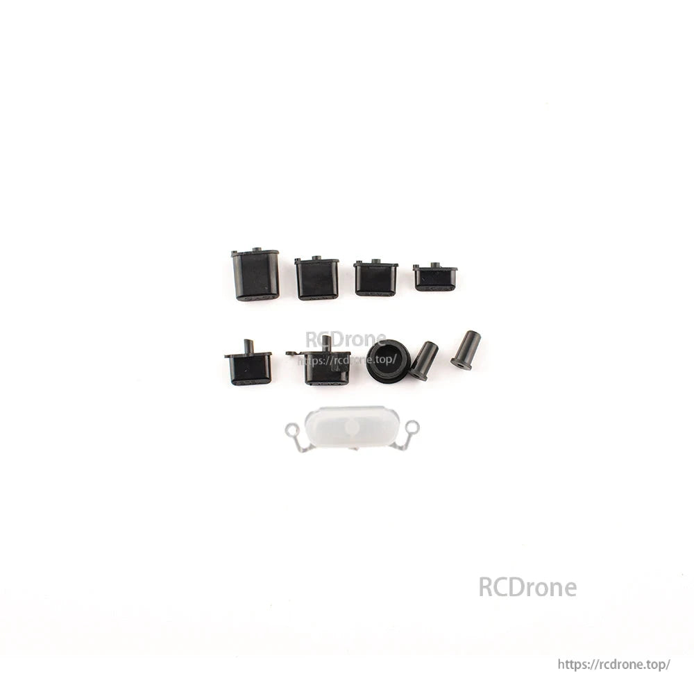 Zorro button set replacement kit contents with multiple black buttons, two screws and a clear insert piece