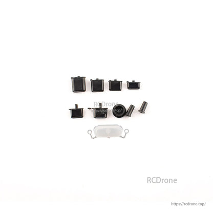 Zorro button set replacement kit contents with multiple black buttons, two screws and a clear insert piece