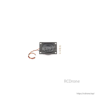 Square speaker front face with cone detail, attached wire lead, and four mounting screws (watermarked)