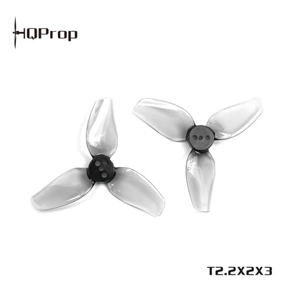 Two grey HQProp T2.2X2X3 three-blade propellers on white background with HQProp logo and model text